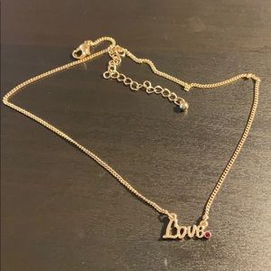 gold “love” choker necklace